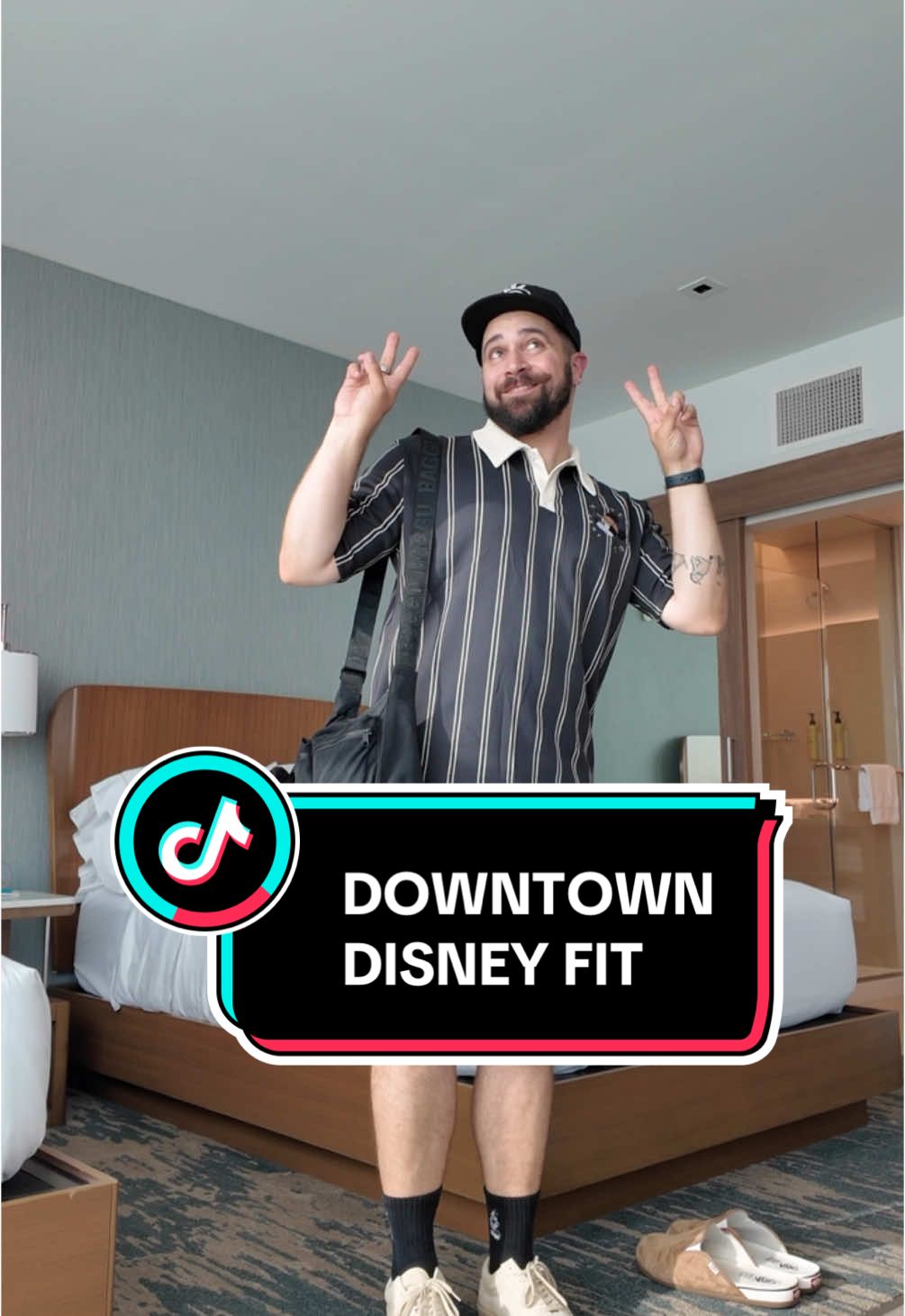 A post by @blakespopnook on TikTok caption: dinner in downtown disney OOTD! 🖤 #disneystyle #ootd #downtowndisney #blakespopnook 