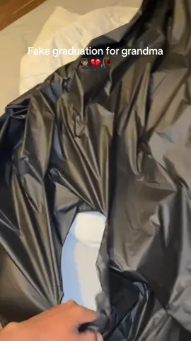 A post by @adrian_peru on TikTok caption: Grandma been waiting for his graduation for years… 🎓🎤🤦🏽‍♂️#SoundCloudUniversity #FakeGraduation #DropOut #College #FakeDiploma #Rapper #CapNGown 