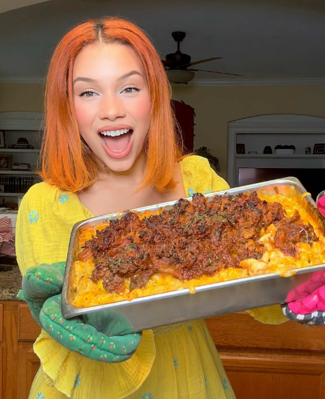 A post by @kyndallsands on TikTok caption: I always measure with my heart! ❤️  THE BEST PULLED PORK MAC AND CHEESE!! 🫕  Ingredients:  Elbow Pasta 🍝 Evaporated Milk 🥛  Heavy Cream 🥛 Garlic Powder 🧂 Tony’s 🧂 Lawry’s 🧂 Butter 🧈  Dijon Mustard 🌭 Paprika 🧂 Sharp Cheddar 🧀 Colby Jack 🧀 Kraft American 🧀 White Wine 🍷  Pulled Pork 🥓 War Hog BBQ Sauce 🥫 Sweet Baby Rays 🥫 Brown Sugar 🍮 Parsley 🌿 