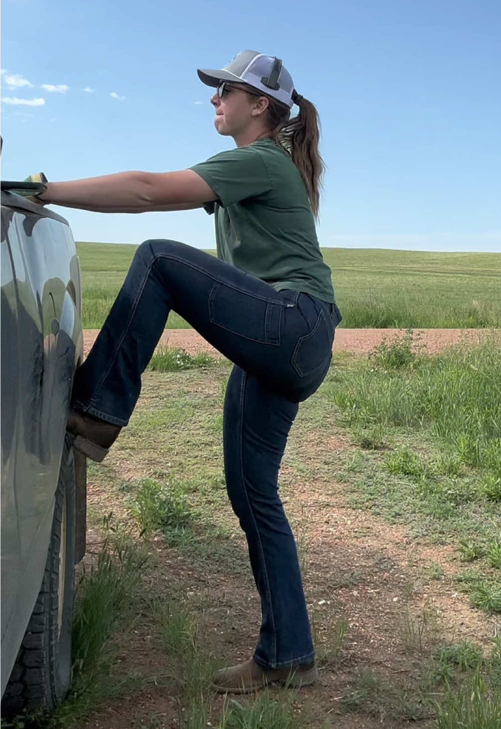 A post by @agwithemma on TikTok caption: Crop scouting means long days, hot weather and lots of walking + moving through the fields!! The Into Town jeans from the John Deere x Dovetail Workwear collab keep up with every second of the day, and I still look good when I head into town 😉 @John Deere @Dovetail Workwear 