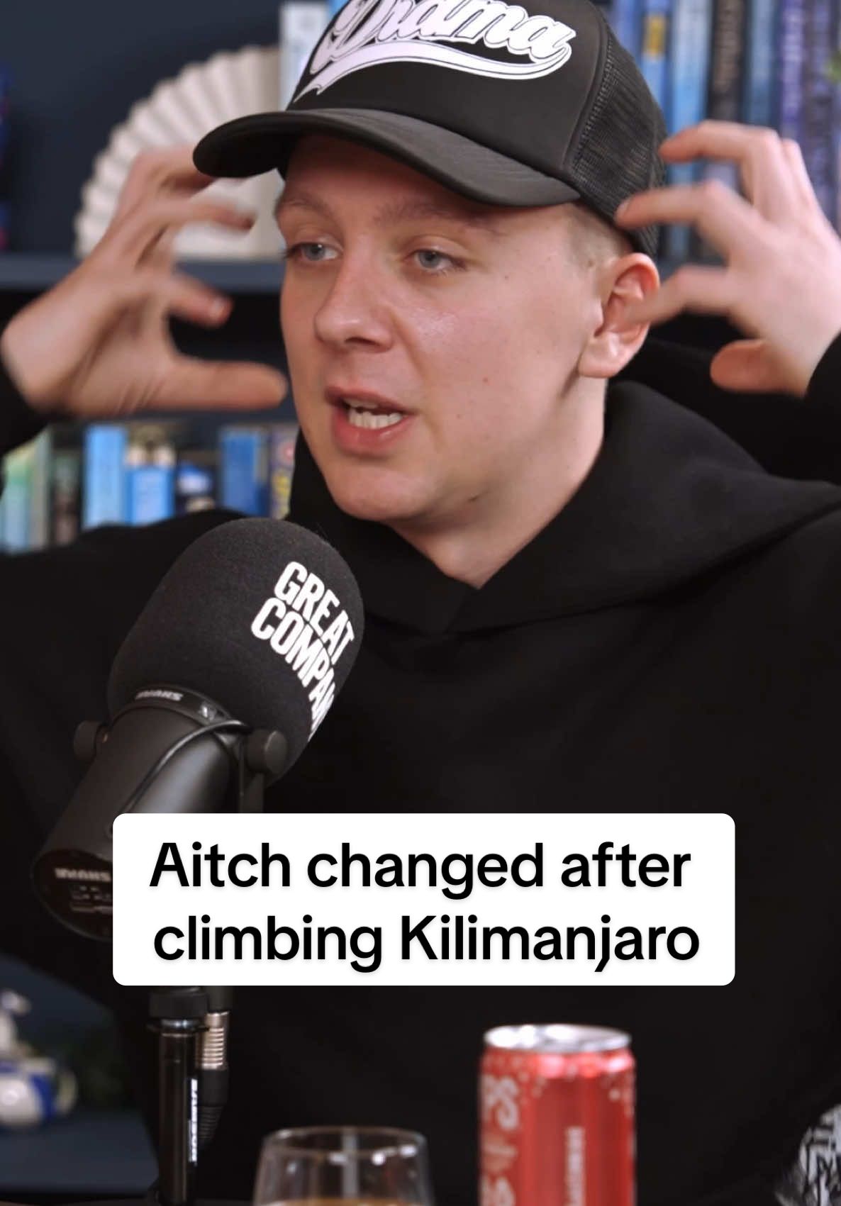 A post by @greatcompanypodcast on TikTok caption: Climbing Kilimanjaro pushed Aitch to his limit.. To watch the full episode search ‘great company podcast Aitch’ on YouTube, Spotify or Apple. #aitch #rapper #podcasts #kilimanjaro #climbing #downsyndromeawareness #charity #jamielaing #greatcompany 