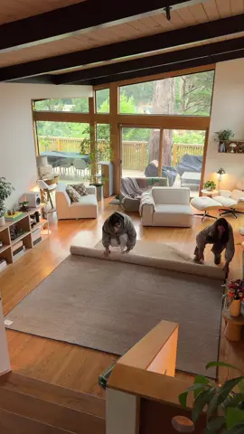 A post by @im_ericwang on TikTok caption: Switching things up 🛋️ #rug #livingroom #homedecor #interiordesign #furniture 