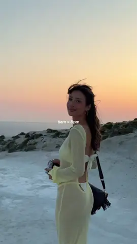 A post by @mayakapouranis on TikTok caption: worth the early morning wake up. 💛there was barely a soul around & it was the most beautiful sunrise I’ve ever seen ❤️‍🔥🌞 📍sarakiniko in milos #milos #milosgreece #sunriseview #honeymoontrip #honeymoonideas 