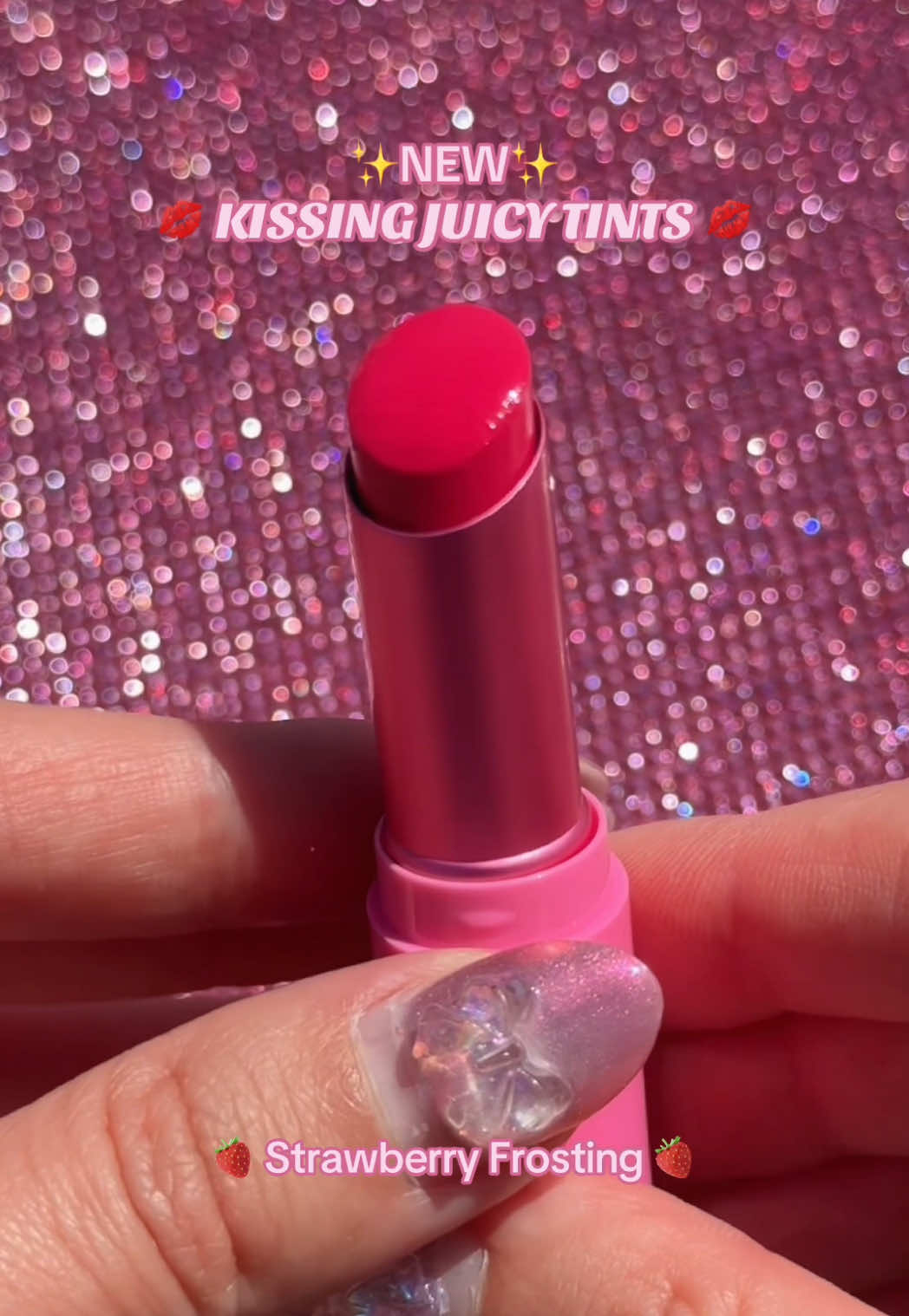 A post by @toofaced on TikTok caption: We love stuff (aka our NEW Kissing Juicy Tints!!) 😍😘💋 This hydrating lip tint is bursting with color and shine and pairs perfectly with our Kissing Jelly Gloss for the ultimate lip treat! 🤭 Shop on TikTok Shop! 💞 #toofaced #tfcrueltyfree 