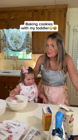 A post by @taylorrandsoph on TikTok caption: This was DEFINITELY a challenge, but I loved every second of it🤣🍪👧🏼 #taylorandsoph #baking #toddler #momsoftiktok #funny #tantrum 