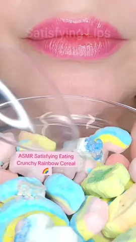 A post by @satisfying..x..lips on TikTok caption: ASMR Satisfying Eating Crunchy Rainbow Cereal 🌈 #asmr #asmrcrunch #satisfyinglips 