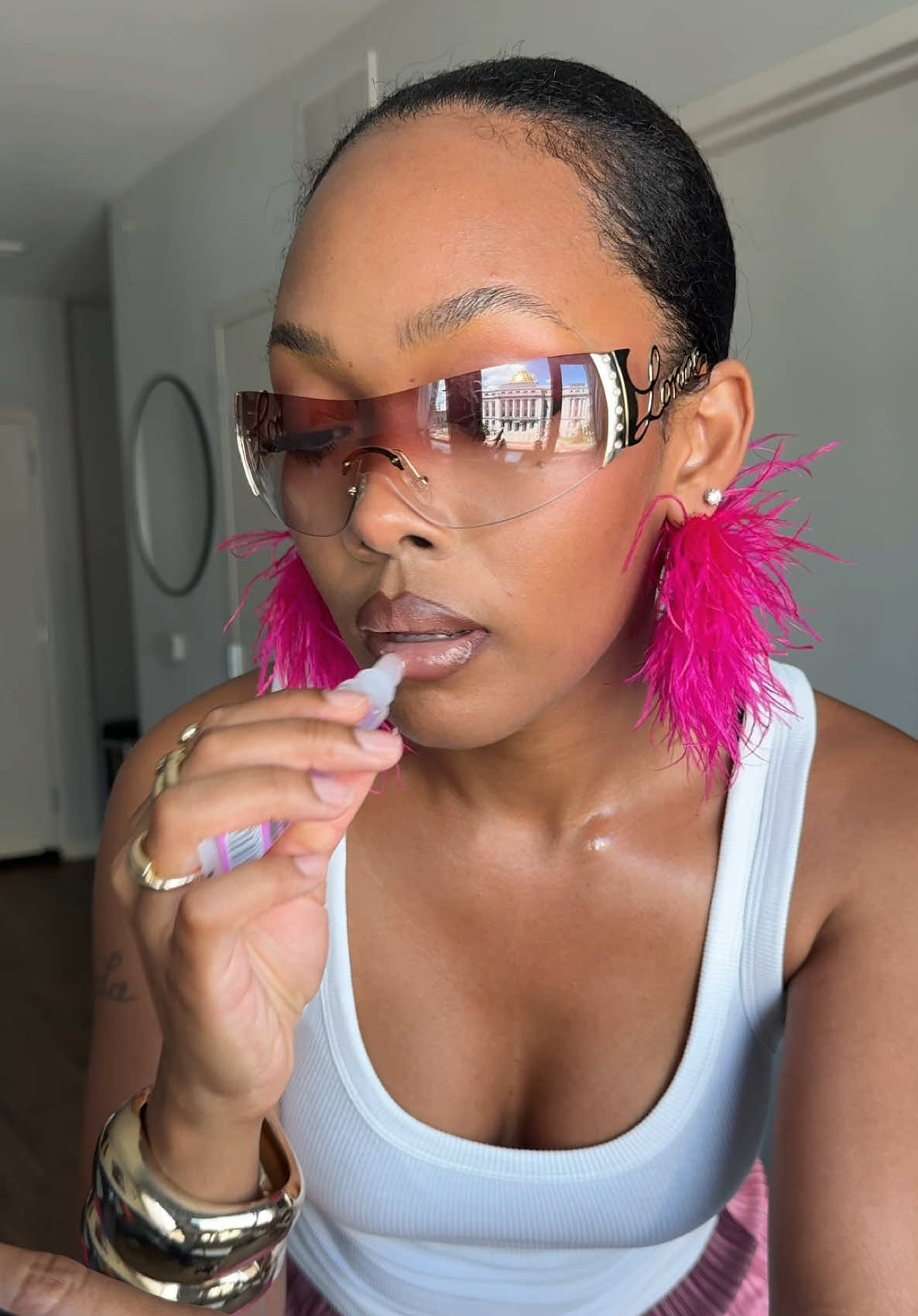 A post by @lelliessantiago on TikTok caption: GRWM who else loves a tank top in the summer #pov #fyp #foryou #fy #grmw #summer #reality 