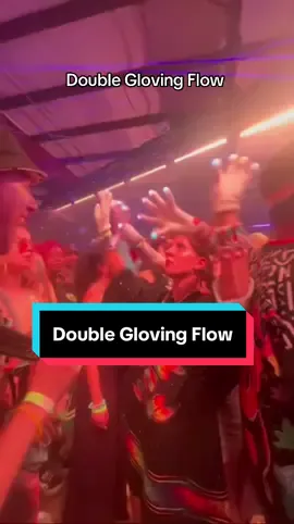 A post by @queerbassqueen on TikTok caption: Improv double gloving flow with @michelle during an LSZEE show @LSDREAM @CloZee 🪩 #flowarts #gloving #edmtiktok #ravers 