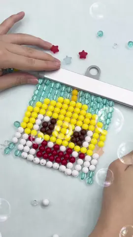 A post by @babyshark_brooklyn on TikTok caption: Tada! Baby Shark made bead by bead!💎 #handmade #diy #beads #BabyShark #DooDooDoo #Brooklyn #beadart 