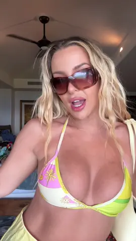 A post by @tanamongeaulol on TikTok caption: my new ideal accessory ✨ which fit is ur favorite??? #letsgetlucy