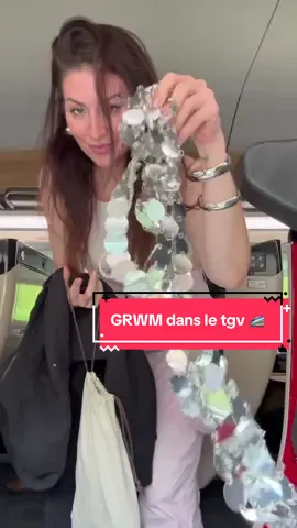A post by @poopiblh on TikTok caption: GRWM dans un TGV 🚄 je fais mon premier look complet de A à Z dans un train pour rejoindre la péniche @L’Oréal Paris sur les quais de Seine et c’est pas si facile ✨ invitation #grwm #look #routine #skincare #makeup #hair #beauty #pink #lorealparis #party #soiree #paris 