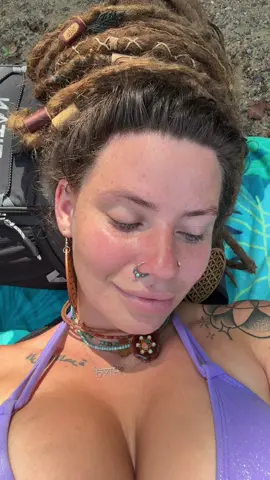A post by @indiflwrx on TikTok caption: river days 🌀 #fakebodyy⚠️ #hippie 