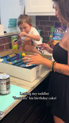 A post by @lorilynngranger on TikTok caption: I’m one of those moms who gets stressed when playdoh is mixed or when the ornaments aren’t perfectly placed on the tree, so things like this are challenging for me! I’m sure a lot of other mamas can relate 🤣 but I’ve learned to kinda let go & not be such a control freak! He deserves that 💙