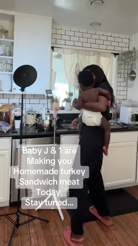 A post by @foodbyjenn on TikTok caption: I love how interested she is in what I’m cooking. I’m living in a dream world. Also, it’s 7 AM, she woke up in the middle of me filming so miss me with the “baby in a diaper” comments. 