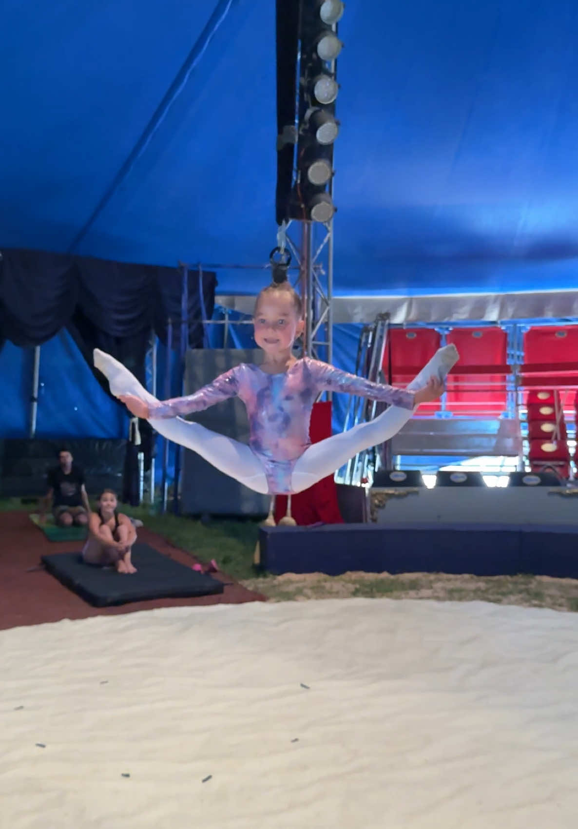 A post by @wow_family_circus on TikTok caption: #hairhanging #circusartist #circus