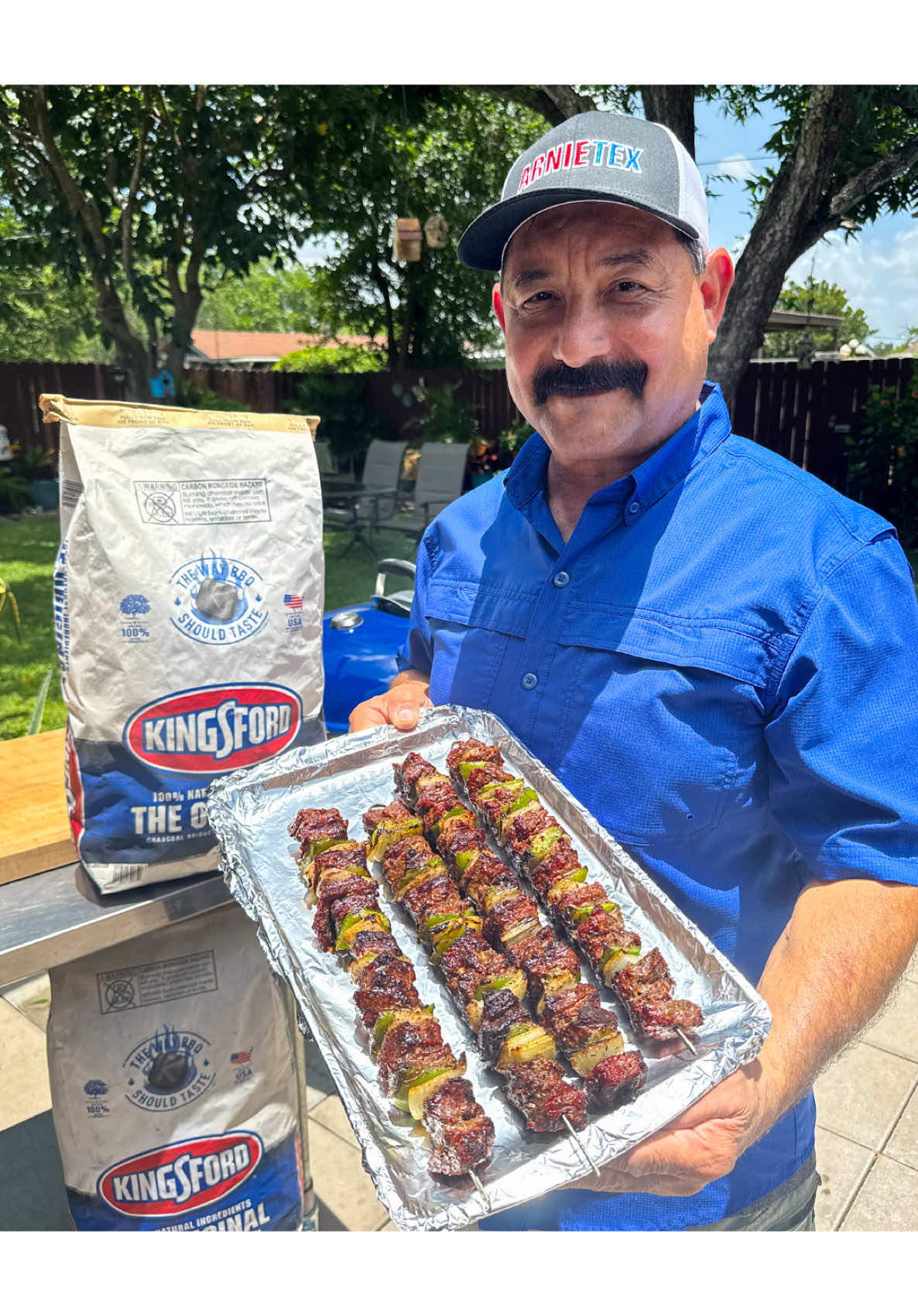 A post by @arnietex on TikTok caption: #ad Summer Grilling Starts Now! And @Kingsford Charcoal is at the heart of it all. This Summer y’all take every chance you can get to fire up that grill alongside friends and family and make your memories bold, flavorful and always shared. May I recommend a recipe where there is something for everyone – like these sausage, chicken and steak skewers! 🔥#kingsford