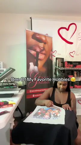 A post by @glittergirlgloss on TikTok caption: I Make All My Merch Shop GlossUpOfficial.com #Htv #tshirt #heatpressmachine #htvvinyl #shirt #gloss #glossup 