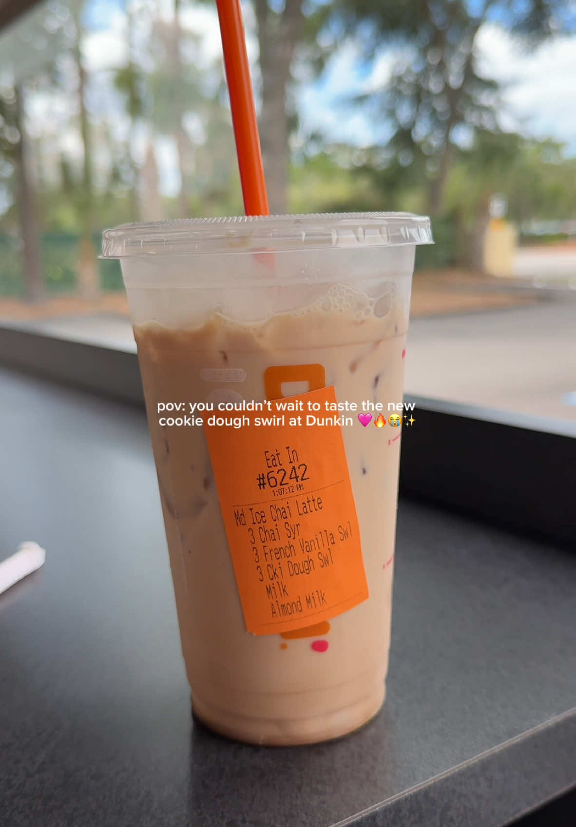 A post by @beautybytian on TikTok caption: The cookie dough swirls gets a 10/10 for me 🥰✨🩷 #dunkin #dunkindonuts #cookiedough #cookiedoughswirl #coffeshop #coffeetiktok #chailatte #icedchailatte #drinktiktok #iceddrinks #foodtiktok 