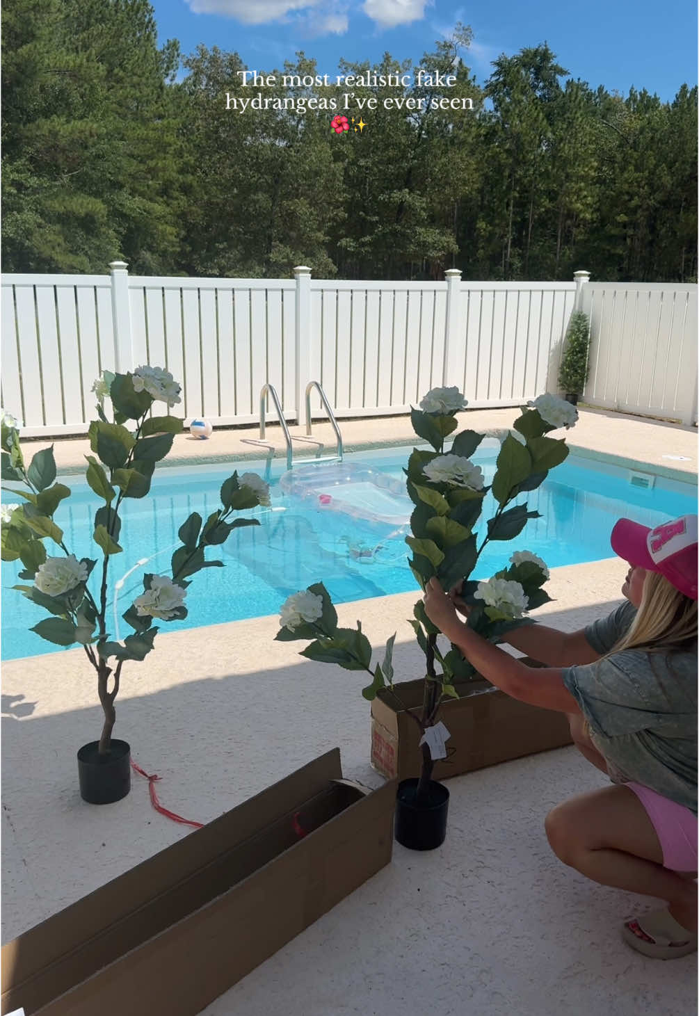 A post by @smalltownbeautybytess on TikTok caption: These are gorgeous but I wanted pink😭🤦🏼‍♀️#pool #outside #decor #momsoftiktok #flowers #summer #fyp 