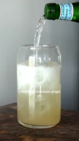 A post by @bearenger on TikTok caption: Homemade Ginger Ale 🫚 Details - 1 cup ginger, chopped - 2 cups water - 1 lime squeezed - 2 tbsps honey - Sparkling water 1. Add your chopped ginger and water to a pan.  2. Let’s come to a boil and turn down heat low. Let simmer for 15 minutes.  3. Turn off the heat and let rest for 10 minutes. 4. Strain into a jar, added lime, and honey, combine.  5. In a glass add ice, half a cup of ginger mixture, and top with sparkling water. Enjoy! #gingerale #healthyrecipe #easyrecipe #foodasmr #wellnesstips 