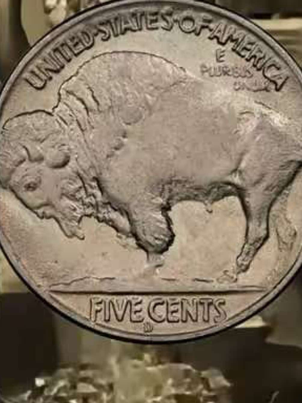 A post by @bullionshark on TikTok caption: 🦬 This coin is missing a leg… and it could be worth $100,000. Yes, you read that right. The 1937-D Three-Legged Buffalo Nickel is one of the most famous (and valuable) mint errors in U.S. history — caused by an over-polished die at the Denver Mint. 👉 Less than 10,000 are known to exist. 💸 Even in low condition, these nickels can fetch $600–$1,000+. 🚨 In 2021, one sold for nearly $100,000 at auction. It might be in your coin jar, an old album, or passed down from a grandparent. 🔍 Go check. 💬 Tag someone who needs to see this. 📲 Follow @bullionsharks for more rare coin alerts & collector tips. #RareCoins #CoinCollector #BuffaloNickel #1937D #MintError #CoinHunting #Numismatics #OverlookedTreasure #CoinTikTok #BullionShark #CoinFinds #USCoins #Collectibles