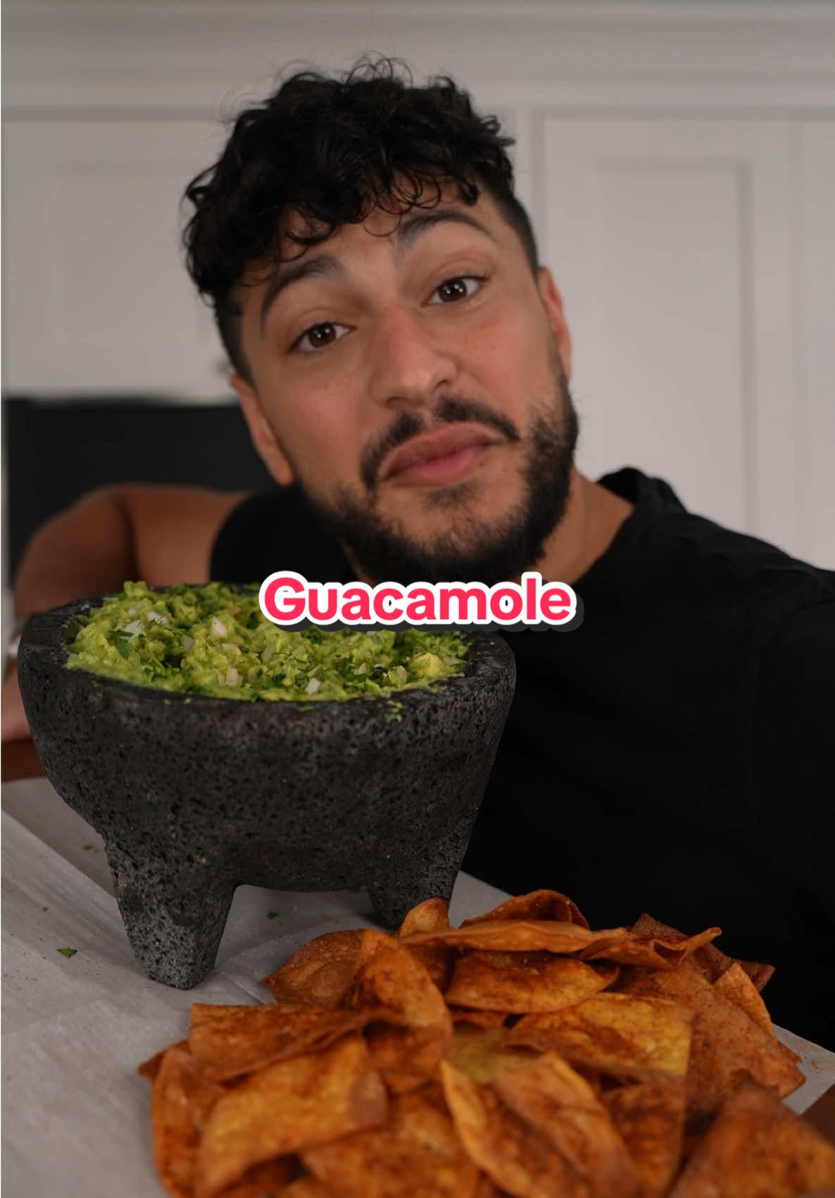 A post by @thegoldenbalance on TikTok caption: The Best Guacamole Recipe 😩  3 avocados  2 cloves garlic  1 Serrano or 1/2 jalapeno  1/2 medium onion (for total amount)  1-2 limes depending on preference  Bundle of cilantro  Salt to taste 