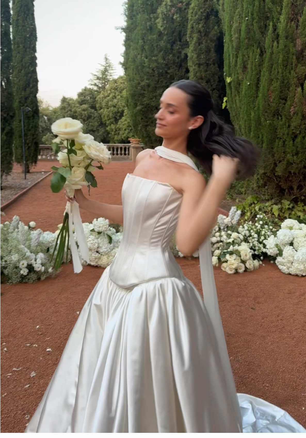 A post by @aliciarev on TikTok caption: oh hello… 💍✨  #wedding #bride #weddingdress 