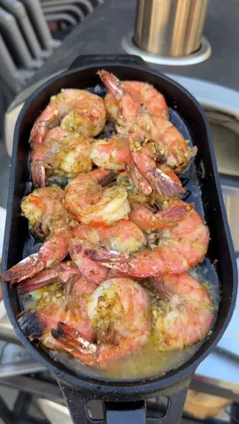 A post by @foodbyjenn on TikTok caption: Cooking shrimp in my Ooni wood-fired pizza oven? Game changer. I heated up a cast iron pan right in the oven, tossed in the shrimp, and let that high heat work its magic. They came out juicy, perfectly charred, and infused with that amazing wood-fired flavor. Who said pizza ovens were just for pizza? #foodtutorials #gourmetfood #foodie #ShrimpRecipe #Cooking #OutdoorCooking #summerrecipes 