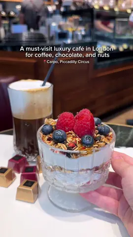A post by @volga_londonstories on TikTok caption: ☕🍫 Just dropped into @carpo in Piccadilly Circus and it’s a true world of indulgence.   From smooth 100% Arabica iced coffee to freshly roasted nuts and handcrafted chocolate, every detail is made to indulge your senses. The aroma, the textures, the flavours… it’s more than just a café, it’s a full-on tasting experience. 🍯🥜🍦 Don’t skip the gelato, Greek yoghurt options, dried fruits or their gorgeous gift hampers, ideal for treating someone special. Have you been to Carpo yet?  ad   #carpopiccadilly #carpolondon #giftideas #londoncafe #londonthingtodo #summerlondon #piccadillycircus #regentstreet #chocolatelover #chocolatelondon #visitlondon #piccadilly #londra #londontiktok #londres #explorelondon 