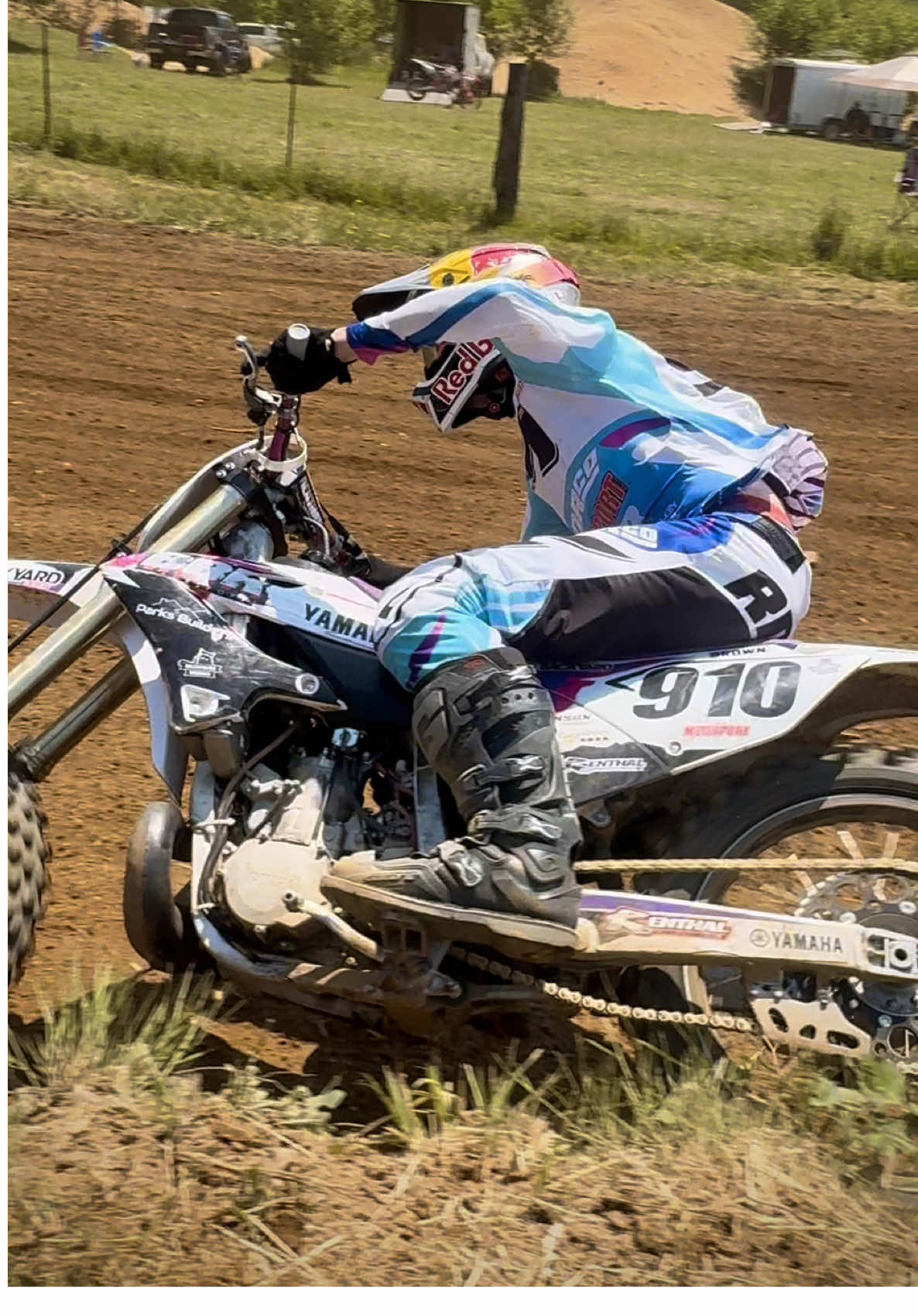 A post by @carsonbrown_910 on TikTok caption: Do you guys like carburetor’s or fuel injection on 2-strokes? Shredding the YZ250 around Burnt Ridge MX never disappoints. Use code “CB910” for 20% off on the @backyarddesign website 🔥 @Red Bull Motorsports @Red Bull @All Balls Racing #YZ250 #Yamaha #2stroke 