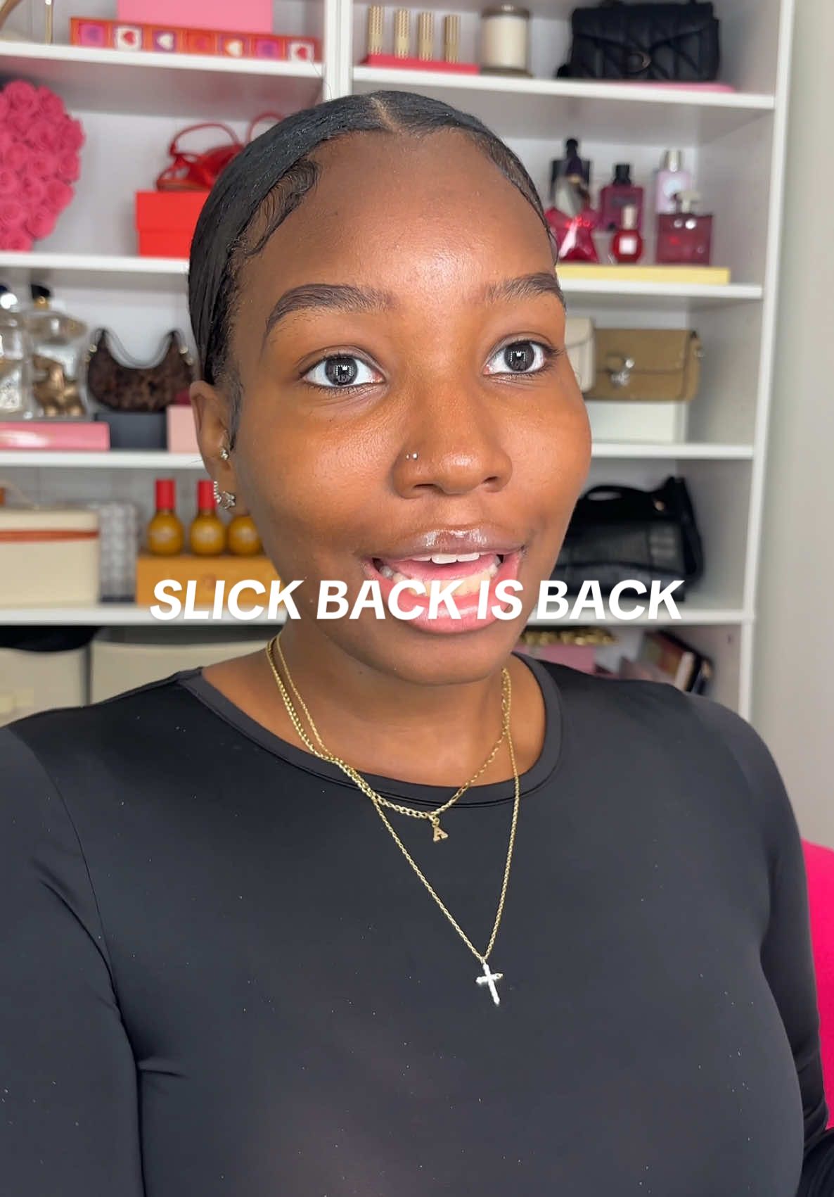 A post by @aniyahserinity on TikTok caption: Let’s do a quick slick back bun for the weekend🥰 All the products I used are already posted! Whenever my silkpress gets too greasy to pull out that dry shampoo my only two options are ponytails or washing it and today I went with a slick back!  Usually I will section it before doing it so it can be fully flat but I was on a time crunch 😫 #slickback #blackgirlhairstyles #grwm #lowponytail #straighthairstyle 