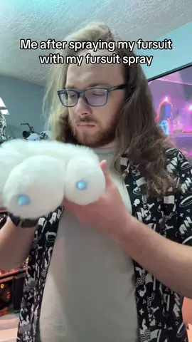 A post by @ on TikTok caption: My fursuit sprays smells so good!