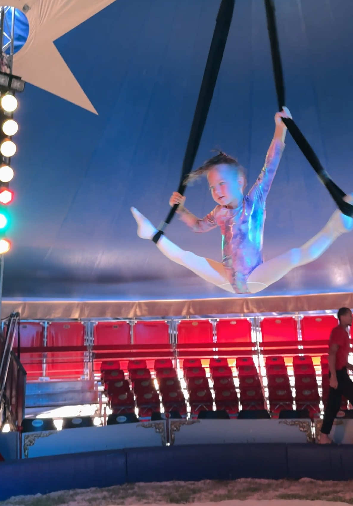 A post by @wow_family_circus on TikTok caption: #aerialstraps #circus #aerialist 