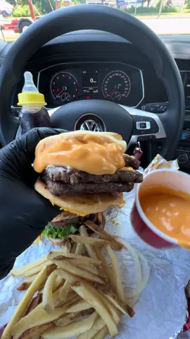 A post by @moeeatss on TikTok caption: Trying Wendy’s new grilled cheese cheeseburger 🍔🧀🔥 #mukbang #ASMR #canadaeats #food #Foodie moe eats #yummy #cheese #chicken #wings #usafoodie #canada @Wendy’s @WendysCanada 