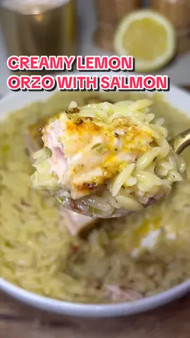 A post by @heresyourbite on TikTok caption: Creamy Lemon Orzo with Salmon 🍋  Ingredients below — full recipe is linked in my Substack!  Orzo: 1 tbsp olive oil 1 tbsp butter 1 shallot, finely diced  Salt and black pepper, to taste 1–2 tsp dried thyme (optional) 2 tsp Calabrian chilies or red pepper flakes (to taste) 3-4 cloves garlic, minced (to taste) 1.5 cups orzo 1/4 cup dry white wine (sav blanc or pinot grigio) 3 cups chicken broth Zest and juice of 1/2 lemon (or more, to taste) 3/4 cup freshly grated Parmesan (or more, to taste) 1/2 cup cream or half & half (to taste) 1–2 tbsp capers (optional) Fresh parsley or dill, for garnish Salmon: 1 lb salmon fillets 1-2 tbsp @eatayoh Dijonayo (or Dijon + mayo, or just Dijon) Salt and black pepper Garlic powder Smoked paprika Olive oil, for drizzling Thin lemon slices #orzo #lemonorzo #creamyorzo #orzorecipe #salmon #bakedsalmon #salmonrecipe #dinner #easydinner #easydinnerideas #dinnerideas #weeknight #weeknightdinner #weeknightmeals #dijon #ayoh #foodtok 