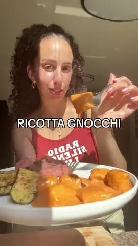A post by @fitwsis on TikTok caption: My Ricotta Gnocchi recipe! Truly one of my favorite dishes ever! Restaurant quality yet SO easy and fun to make! Recipe⬇️ GNOCCHI RECIPE 1 cup flour 2 cup ricotta  3/4 cup grated Parmesan   3 egg yolks 1 tsp salt  1/2 tsp pepper STEPS 1. Line a plate with a paper towel and spread out ricotta cheese onto it. Place another paper towel on top and gently press down to absorb excess moisture (can also use a cheese cloth to remove moisture) 2. Mix ricotta and egg yolks in a bowl until smooth. Then add flour, parm, salt and pepper. Mix well then use hands to form into a dough.  3. Flour your surface or cutting board and shape dough into a 8 inch disc. Cut into 8 equal slices. Roll each slice into long logs then cut into 1 inch bite size gnocchi pillows 4. Boil in salted water for 3-4 minutes or until gnocchis start to float to top. Add immediately to sauce of choice and serve.  CREAMY RED SAUCE 2 tbs butter 1 tbs olive oil 1 diced shallot 4-5 cloves minced garlic 2 large tbs tomato paste 1 tsp chili flakes 1/3 cup white wine  1.5-2 cups heavy whipping cream 1/2 cup grated Parmesan  1 tsp salt  1/2 tsp pepper 1/2 tsp chicken bouillon (optional) STEPS 1. Melt butter and olive oil in a pan and saute shallots and garlic until fragrant. Mix in tomato paste and chili flakes and sauté for 1-2 minutes.  Pour in white wine and saute until it reduces (allow at least half of wine mixture to evaporate).  2. Pour in whipping cream and bring to a light simmer. Once it starts to thicken, season with seasonings and Parmesan.  3. Then serve with your favorite pasta ❤️‍🔥