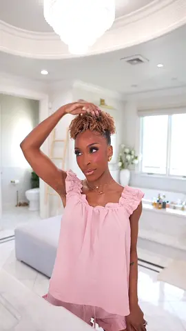 A post by @jackieaina on TikTok caption: #naturalhair 