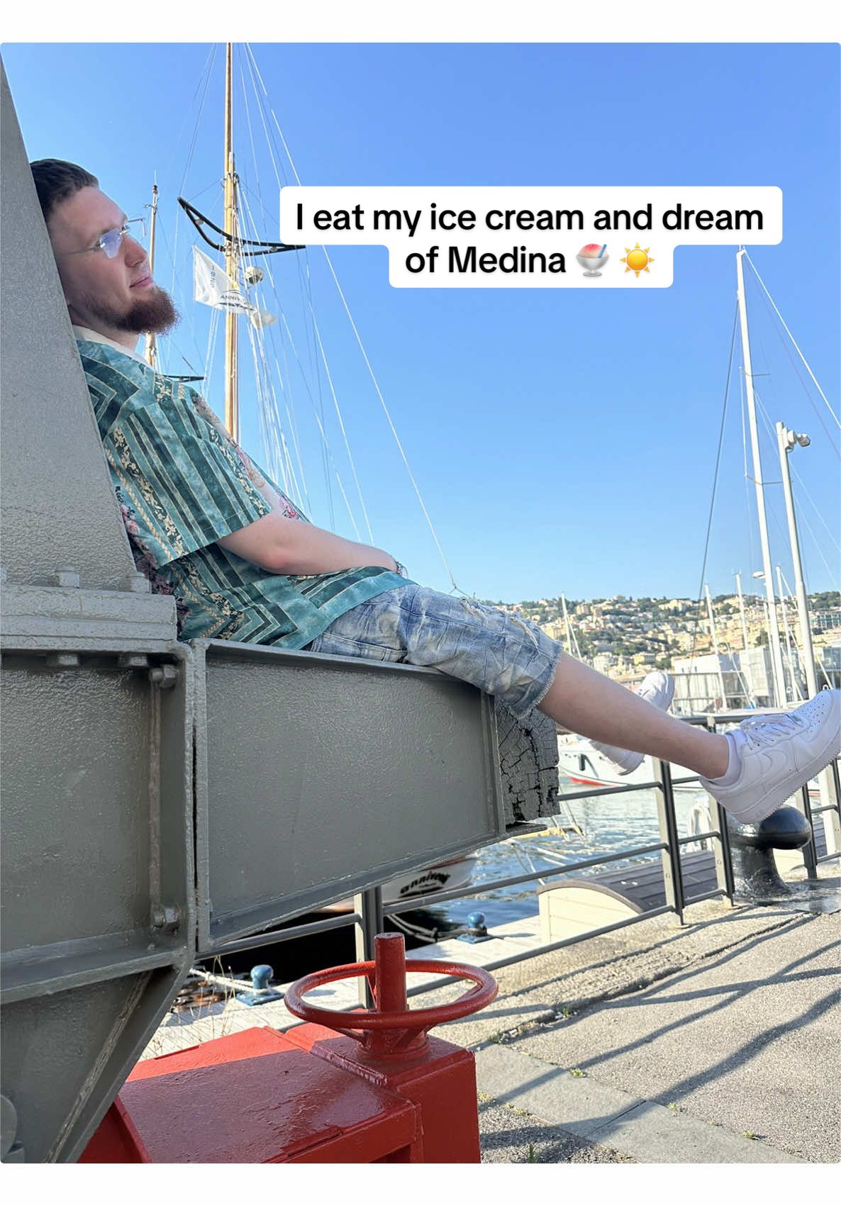 A post by @hamzafatou on TikTok caption: I eat my ice cream and dream of Medina 🍦☀️ #muslim #muslimcouple #fürdich #maherzain 