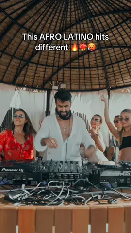A post by @johnelleofc on TikTok caption: It feels like an epic summer party 🔥🏝️❤️‍🔥 #johnelle #summervibe #newsong #afrolatino #afrohouse #newmusic 