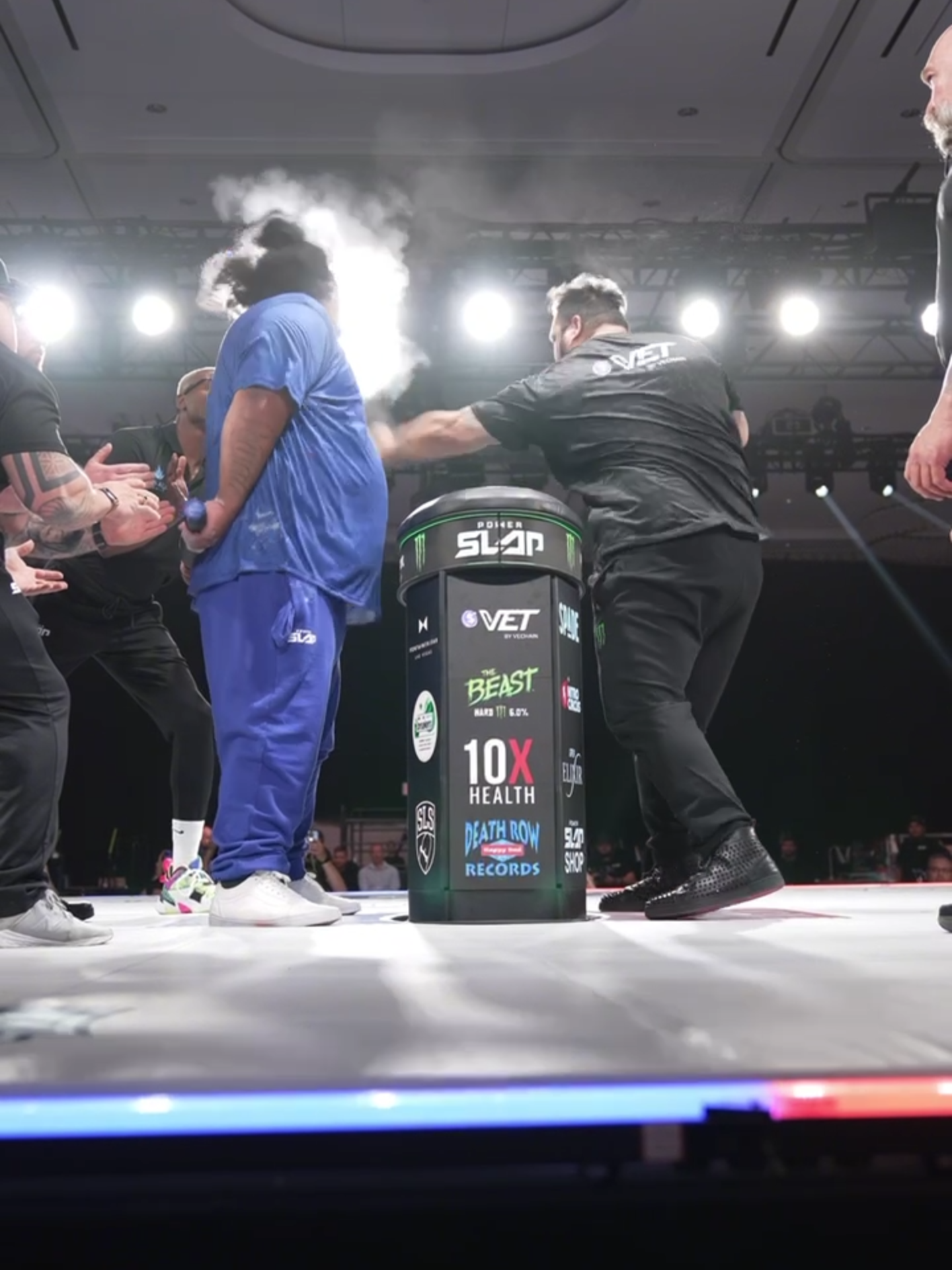 A post by @powerslap on TikTok caption: The Super Heavyweights went at it at #PowerSlap13 💥  [ $VET #PowerSlap14 | Friday July 18th | Live on YouTube | Tix Available in Bio 🎟️ ]