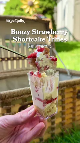 A post by @cocktails on TikTok caption: The perfect summer picnic dessert but with a boozy twist. 🍓 Link for the mini dessert cups is in our bio. @cocktails may earn commission through links in our socials. Cake Ingredients: - 2 cups AP flour - 1 cup powdered sugar - 1 pinch of salt - 2 tbs. baking powder - 1/2 cup cold sweet cream butter - 1/2 cup milk - 1 tsp vanilla - 1 egg - 2 oz. amaretto Whipped Cream Ingredients: - 1/2 cup powdered sugar - 3/4 cup heavy cream - 2 oz. Baileys On the side: - 1 cup finely chopped strawberries Steps: 1. Sift dry ingredients then whisk in a bowl 2. Add cold butter chunks and mix in using a hand mixerIn a separate bowl, combine wet ingredients 3. Once wet ingredients are combined, fold into dry then pour into a greased & lined cake pan 4. Bake for 12 minutes at 400F, then allow to cool for 10 minutes out side of the oven 5. While that cools, combine whipped cream ingredients in a cold bowl. Make sure heavy cream is cold 6. Beat with a hand mixer until fluffy with stiff peaks, then scoop into a piping bag 7. After cake has cooled, cut into small crumbly squares. It's okay if it breaks! Just needs to be small pieces 8. Now, for the layer process, add a small scoop of cake crumbles in the mini dessert cups, then the whipped cream, then the strawberries. Repeat until full then close with the lid. 9. Store in the fridge until serving and enjoy! #boozy #strawberry #shortcake #baileys #dessert #picnic #summer #recipe #inspo