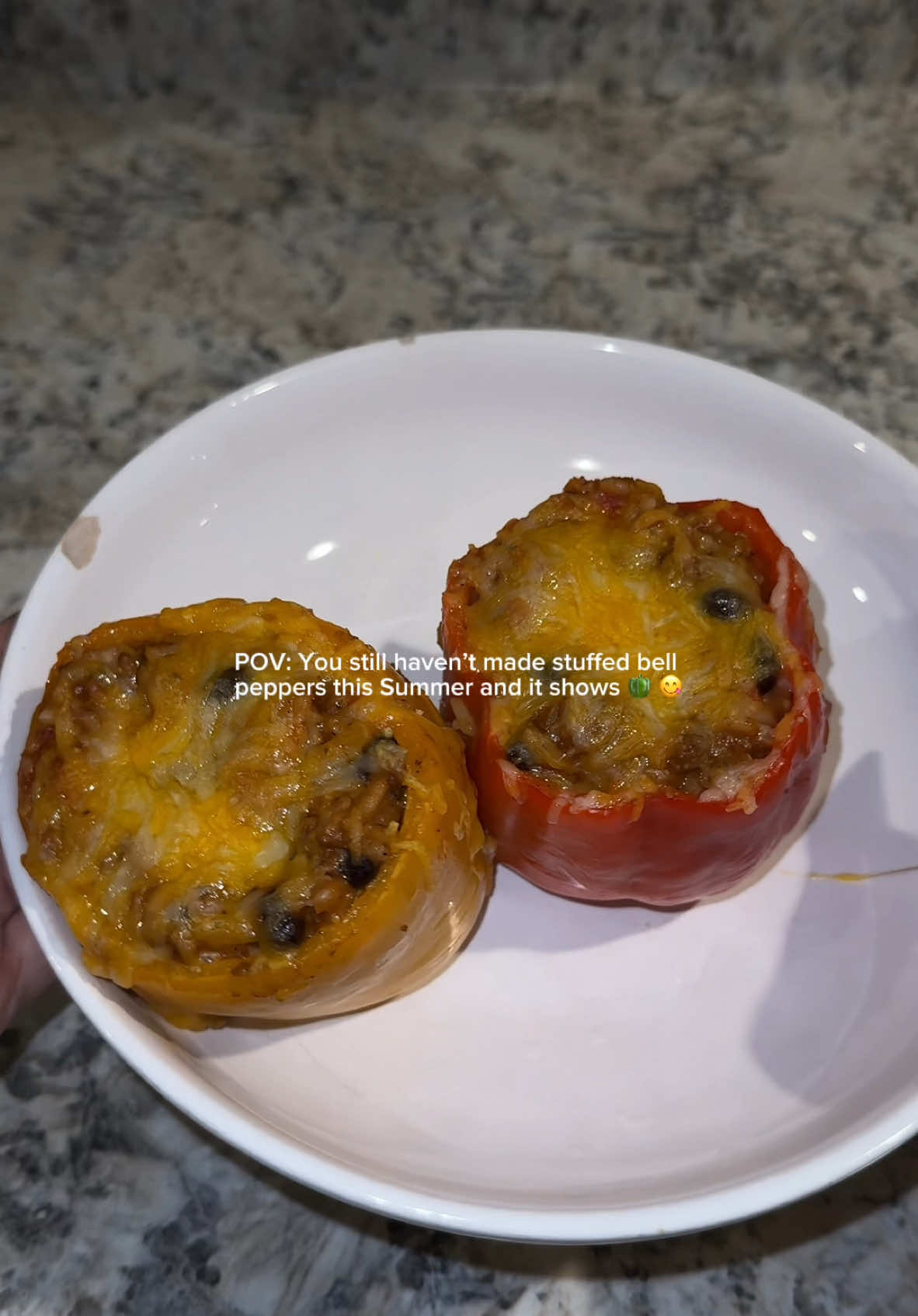 A post by @beautybytian on TikTok caption: Stuffed Bell Peppers 🔥 #MaestriDelPov #pointofview #stuffedbellpeppers #bellpeppers #stuffedbellpepper #foodtiktok #food #foodtok #cooking #cookingtiktok #cookingtok #homemadefood #satisfying 