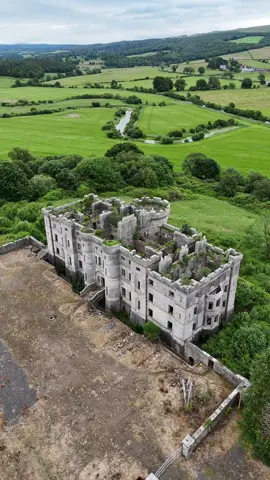 A post by @castlesofscotland on TikTok caption: Dalquharran Castle is a historic mansion located in South Ayrshire. It was commissioned by Thomas Kennedy in 1785 as a new ancestral seat for his descendants, after Old Dalquharran Castle (ruins of which stand on the same land approximately 300m away) became uninhabitable. The castle was designed by Robert Adam, the renowned Scottish architect responsible for the building of nearby Culzean Castle. Dalquharran features classical elements such as columns, pediments, and intricate detailing. The building is considered a fine example of the Georgian era's grand country houses.  Over the years, Dalquharran Castle has undergone various changes in ownership and use. It served as a residence for the Kennedy family for several generations until the 1930s before being sold. It was later used as a youth hostel and as a school for the deaf. Eventually, Dalquharran became too costly for subsequent owners to maintain and was abandoned, with the roof strategically removed in the late 1960s as a means of avoiding paying tax #scotland #abandoned #castle #history #abandonedplaces #explore #beautifuldestinations #travel #scottishtiktok #haunted #hiddengems #outlander #castlesofscotland #castles #fyp 