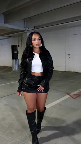 A post by @edgebyks on TikTok caption: A vibe🖤shop “Into The Day Faux Leather Jacket & Skirt” back at edgebyks.com #edgebyks #fyp #leatheroutfits #streetstyle #matchingset 
