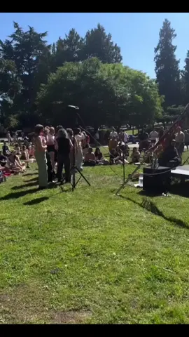 A post by @grandpakimyadawson on TikTok caption: Thanks for all the dancing and hugs at Mt. Baker Pride in Seattle yesterday! That was such a sweet event. Thanks Ondrea for inviting me! I really needed to get out of my own head, dig my naked hobbit toes into the grass, and scream my dissent into the wind with you all. Soul replenishing.  The clip here cuts off the longer list of people and organizations and genocides we denounced. I’m sure you can imagine. It was the first time in 5 years I hugged strangers. I used to hug everyone at every show. I don’t think I realized how much that part of shows fuels me. For plague reasons I’m not sure I will always do it but I sure did need it yesterday. I love you all always: My gays of all ages. My trans grandkids. My Brown clown posse. And that one guy who looked like he should be on Love Island. I’ve got all your backs. Thanks for having mine.  Happy Pride.  🏳️‍🌈❤️🏳️‍⚧️ *if you were the person who asked me to sign your sketchbook with your special pen can you send me a picture of your drawing? *And thanks for standing in the hot sun for hours to get merch. I underestimated how many of you would choose little Pride over big Pride, then saw you all coming in and realized oh right. These peeps are a bit of me. We love community. We are easily overstimulated. So I didn’t bring enough stuff for how many people showed up! I sold out of hats, patches, totes, and crew socks. There are more of all of that available at the merch link in the link tree in my bio.