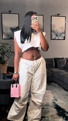 A post by @ on TikTok caption: I need it to be an "Aston Martin Music" summer! #OOTD #fyp #CapCut 