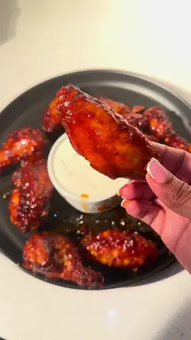 A post by @cookingwithdestiny_ on TikTok caption: Spicy bbq chicken wings 🍗 w/ @Dan-O’s Seasoning #outlaws #danospartner 
