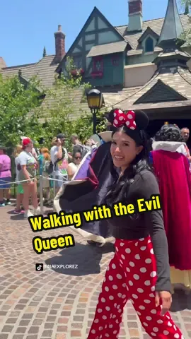 A post by @tinaexplorez on TikTok caption: The Evil Queen has to be one of my fav characters at Disney 👑❤️ #fyp #viralvideo #viral #evilqueen #snowwhite #disneylandtiktok #disneyland 