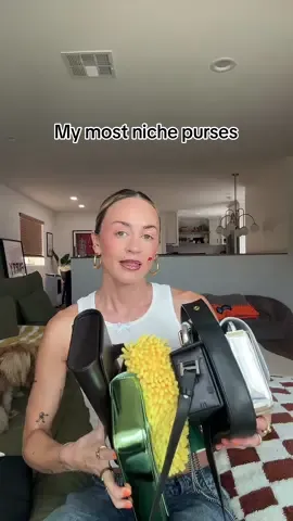 A post by @christinakirkman on TikTok caption: my most niche bags #purse #bagcollection 