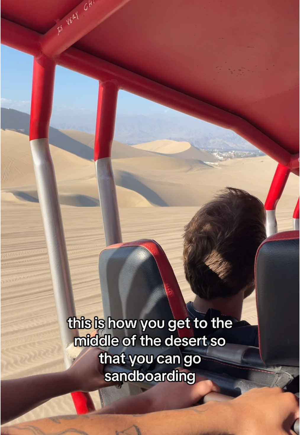 A post by @morgaanfoley on TikTok caption: Sand boarding in the desert in Peru🌵🏜️🇵🇪 #traveltiktok 